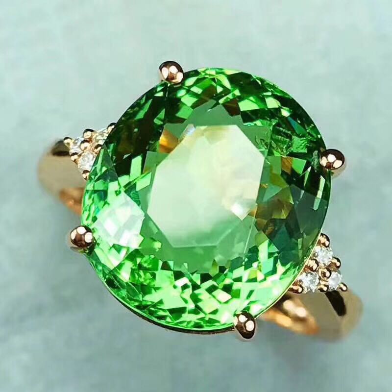 Peridot crystal ring for women with sparkling design